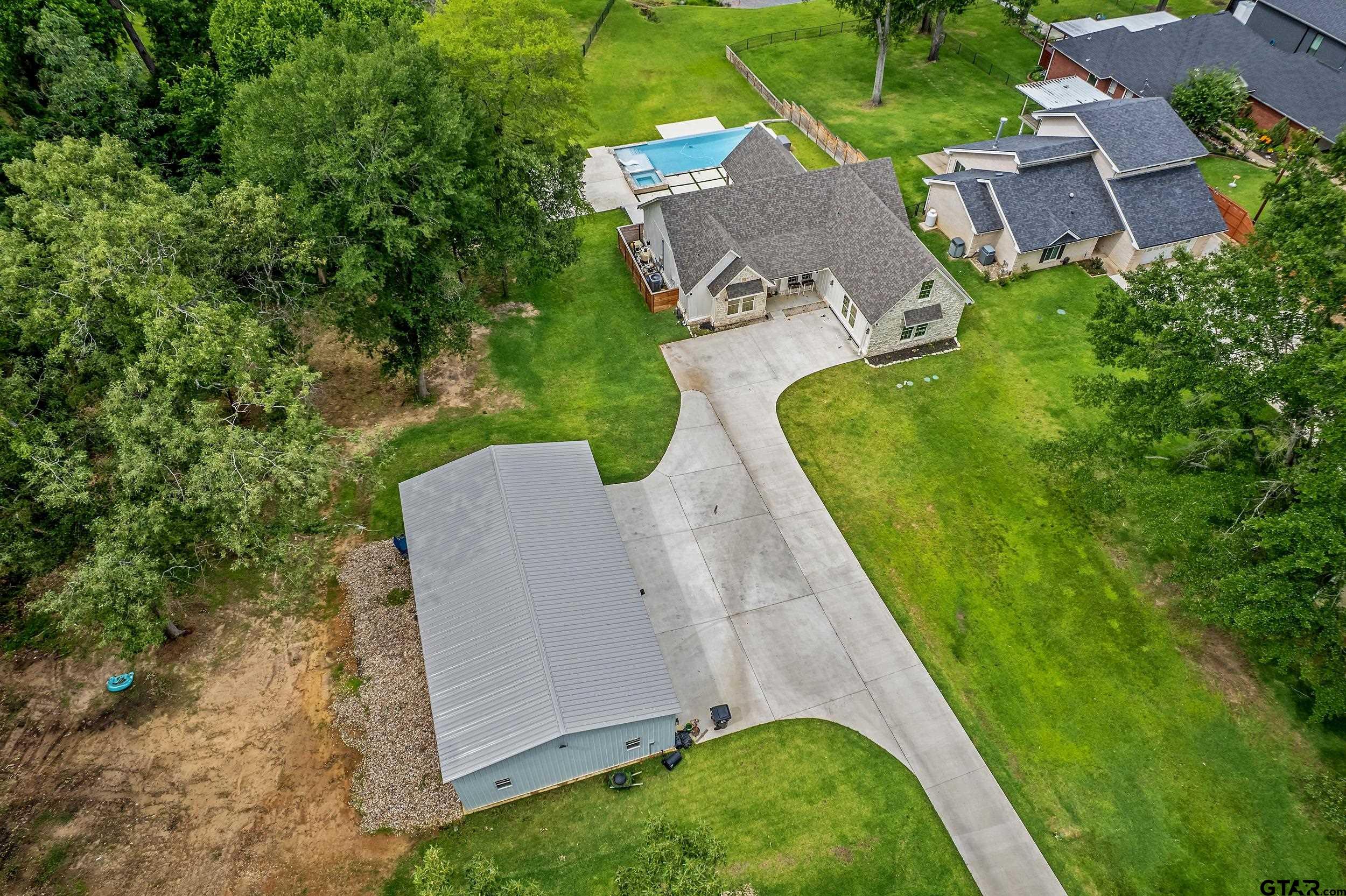 16837 Wilson Road Tyler, TX 75707 - Photo 4 of 44 an aerial view of a house with outdoor space and sitting space