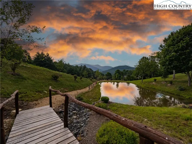 a view of a street with sign board