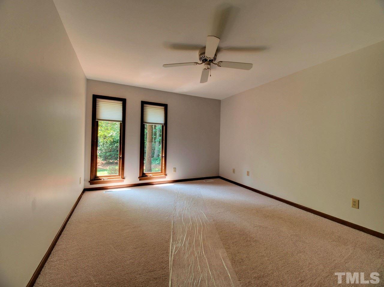 8316 Heel Stone Court Raleigh, NC 27613 - Photo 16 of 25 an empty room with windows