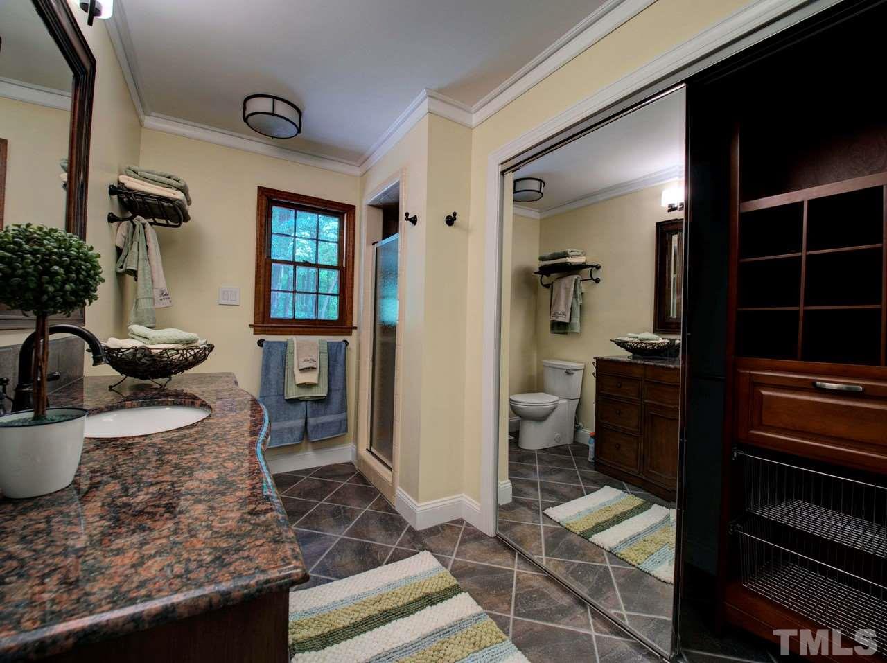 8316 Heel Stone Court Raleigh, NC 27613 - Photo 19 of 25 a living room with furniture and a window