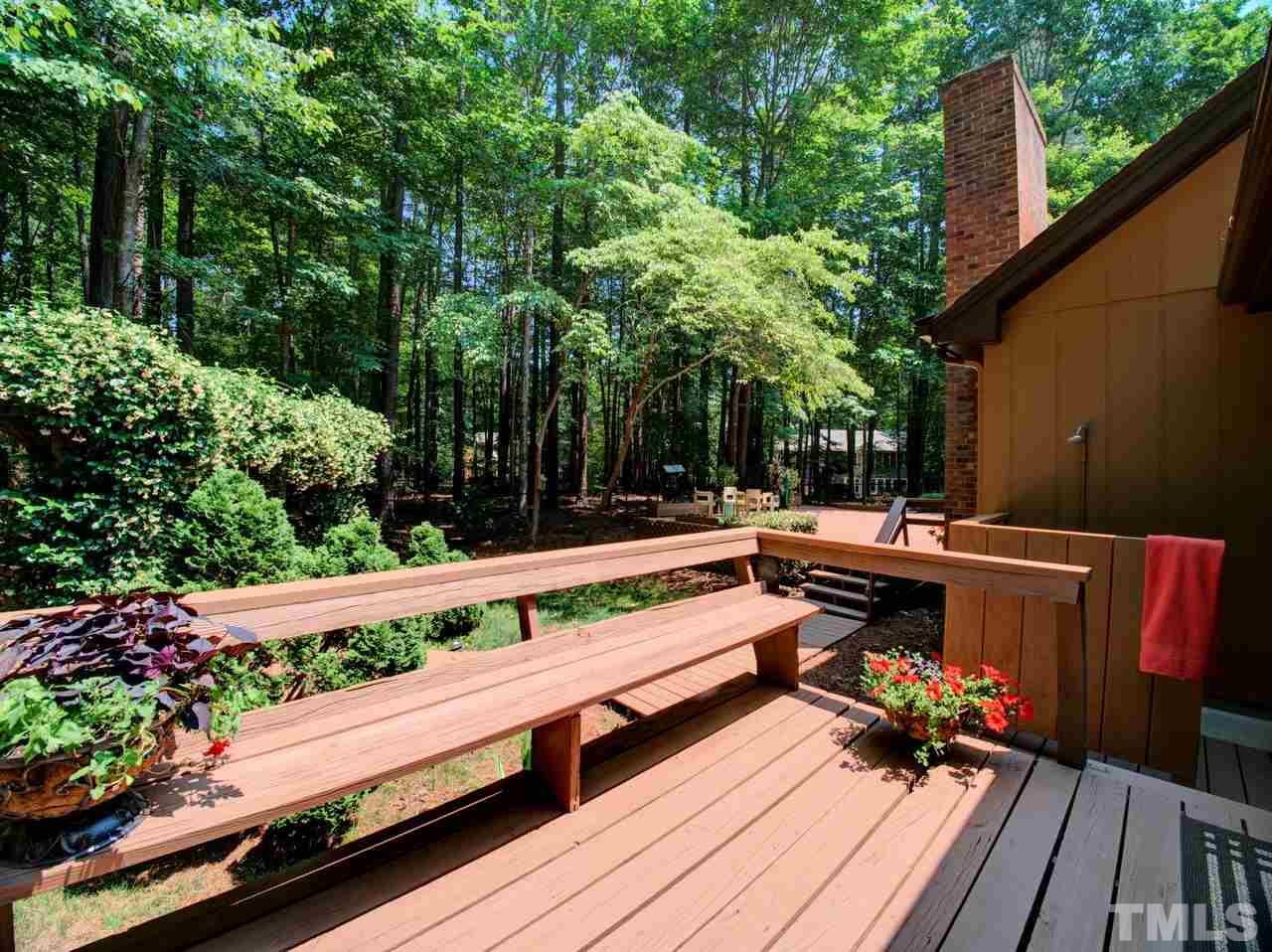 8316 Heel Stone Court Raleigh, NC 27613 - Photo 21 of 25 a view of a bench in a balcony