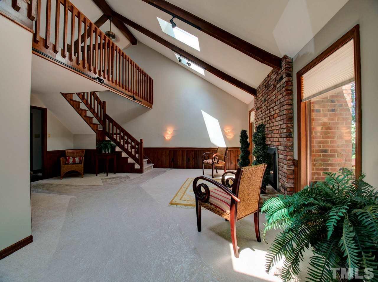 8316 Heel Stone Court Raleigh, NC 27613 - Photo 6 of 25 a outdoor space with lots of furniture and stairs