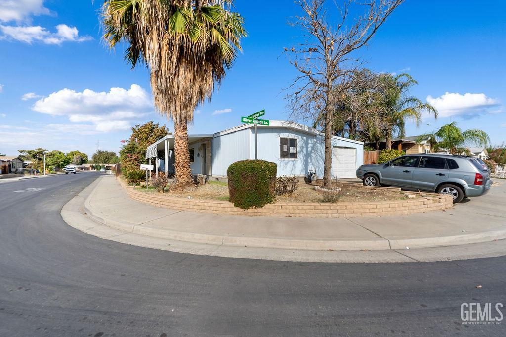 Undisclosed Address Bakersfield, CA 93313 - Photo 2 of 15 a car parked on the side of the road
