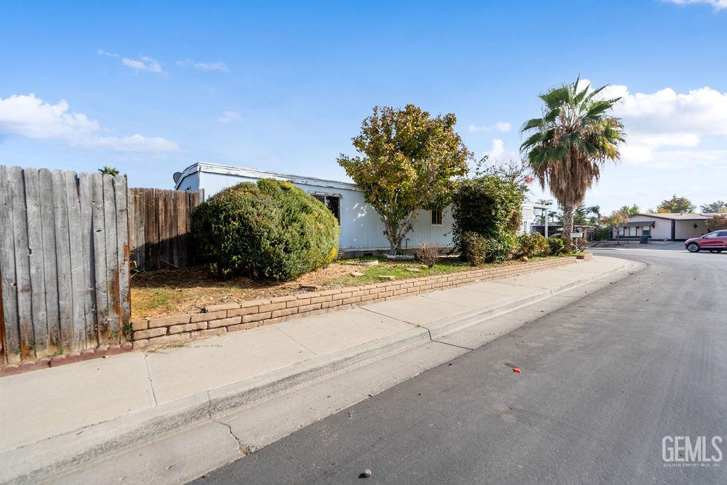 Undisclosed Address Bakersfield, CA 93313 - Photo 3 of 15 a view of a street with a building
