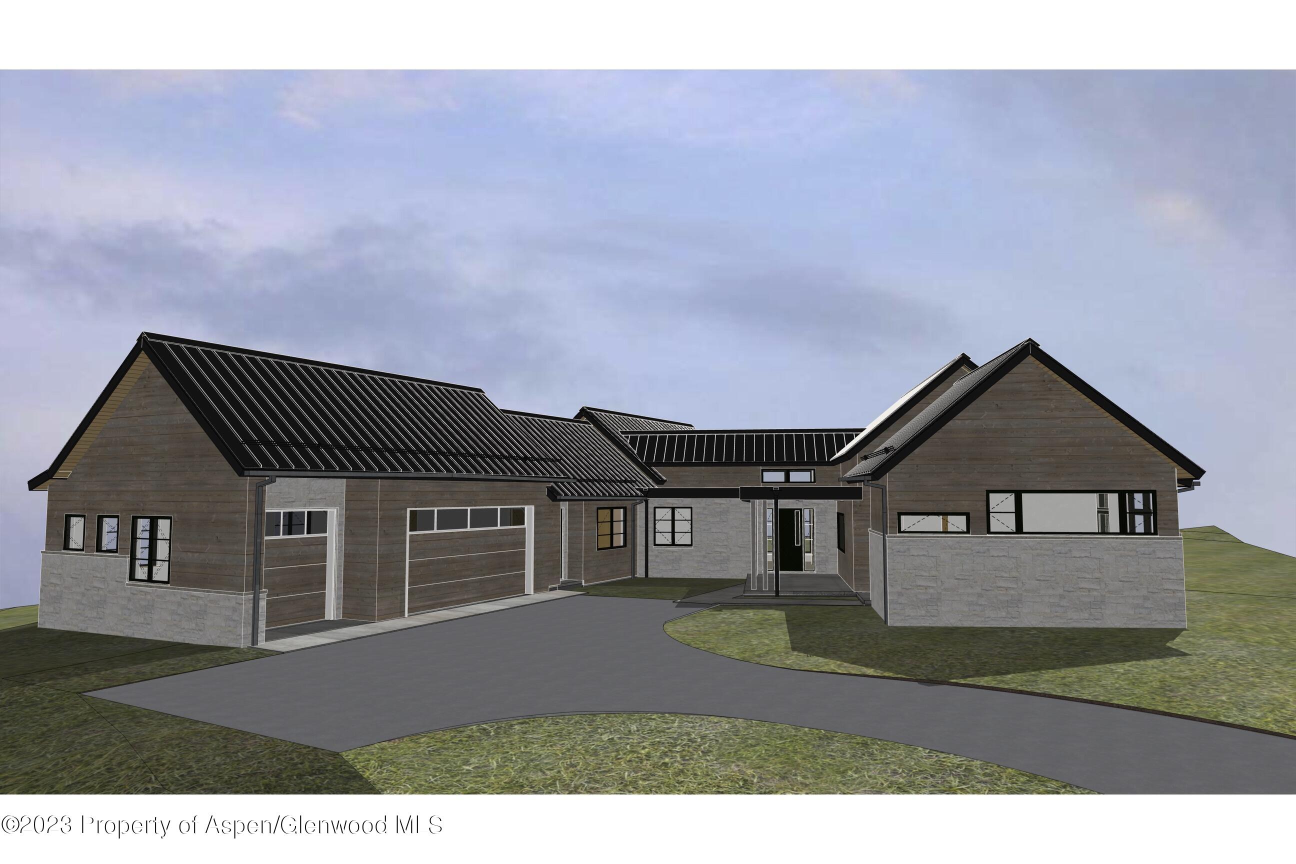 0 Midland Loop Carbondale, CO 81623 - Photo 5 of 13 a front view of a house with a yard