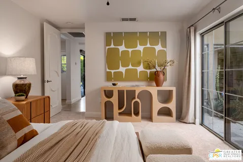 a view of entry way with wooden floor and windows