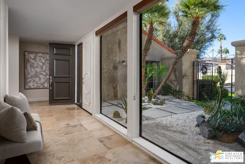 a view of backyard of the house