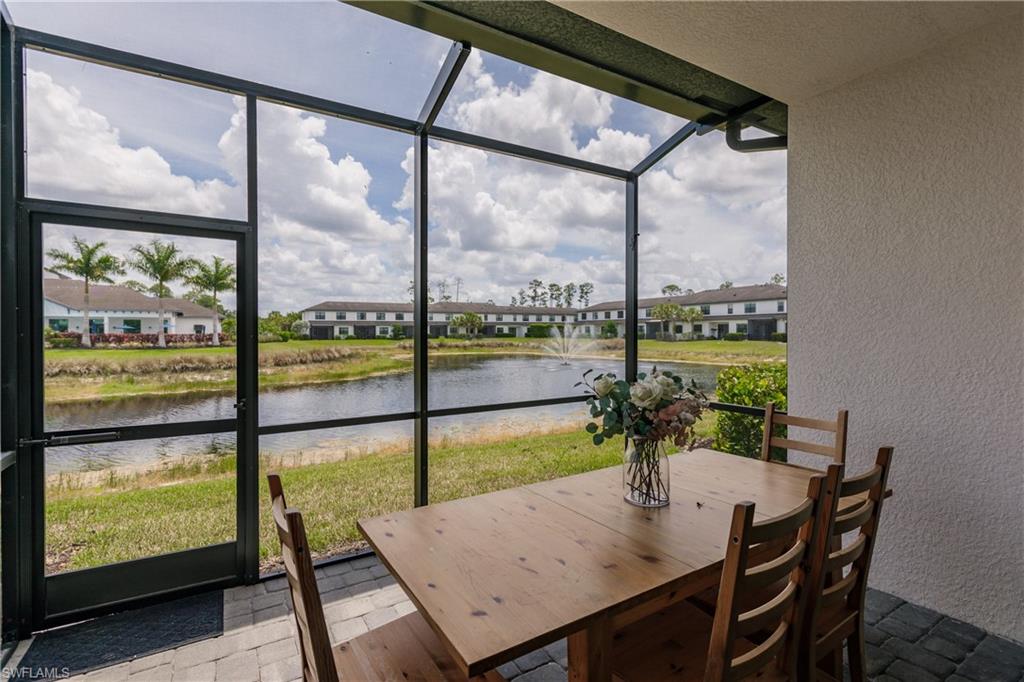 7536 Carnegie Way Naples, FL 34119 - Photo 21 of 23 a view of a room with furniture and window