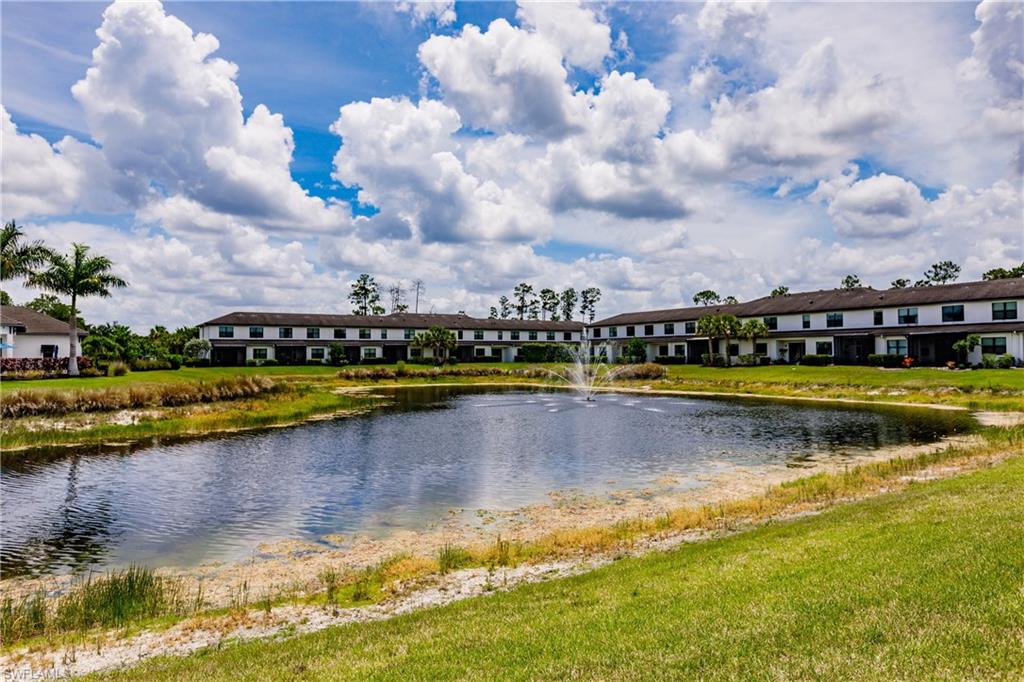 7536 Carnegie Way Naples, FL 34119 - Photo 23 of 23 a view of a swimming pool and mountains