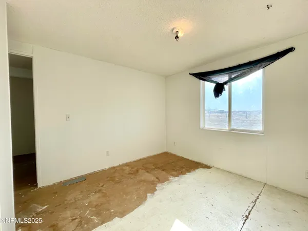 a view of a room with a window