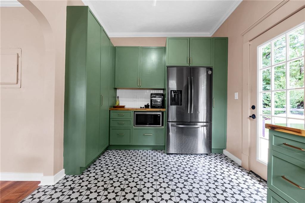 1608 Carroll Drive Northwest Atlanta, GA 30318 - Photo 15 of 43 a kitchen with a refrigerator and a sink