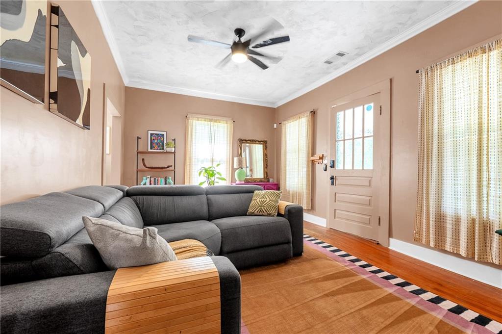 1608 Carroll Drive Northwest Atlanta, GA 30318 - Photo 5 of 43 a living room with furniture and a window