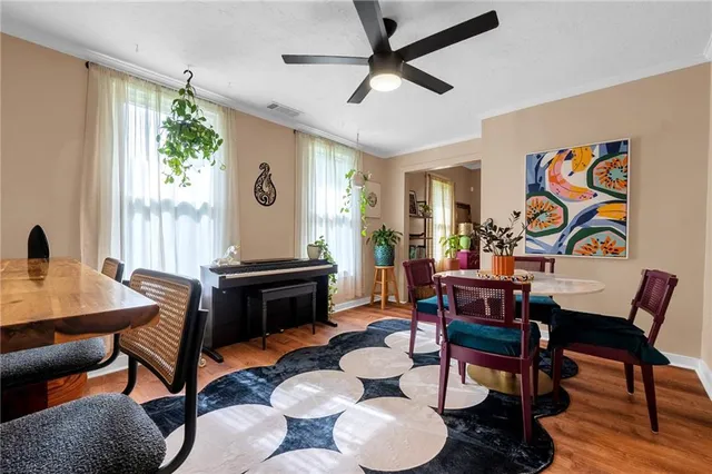 a kitchen with a refrigerator and a sink