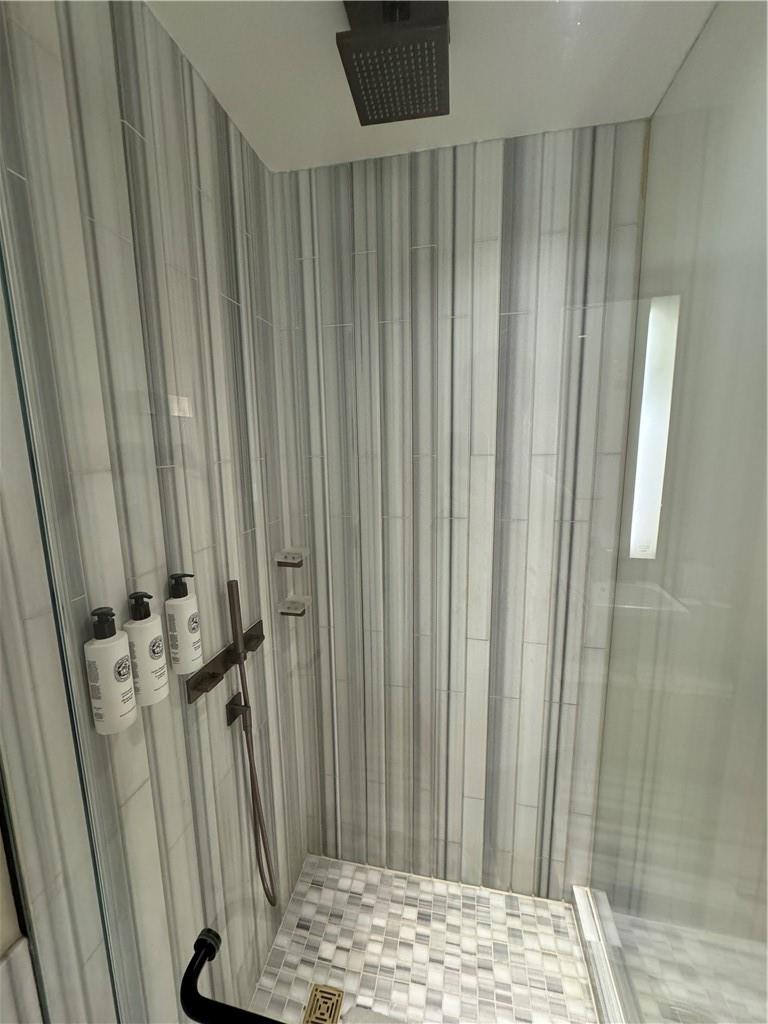 246 Spring Street, Unit 1502 Manhattan, NY 10013 - Photo 16 of 16 Bathroom with a shower