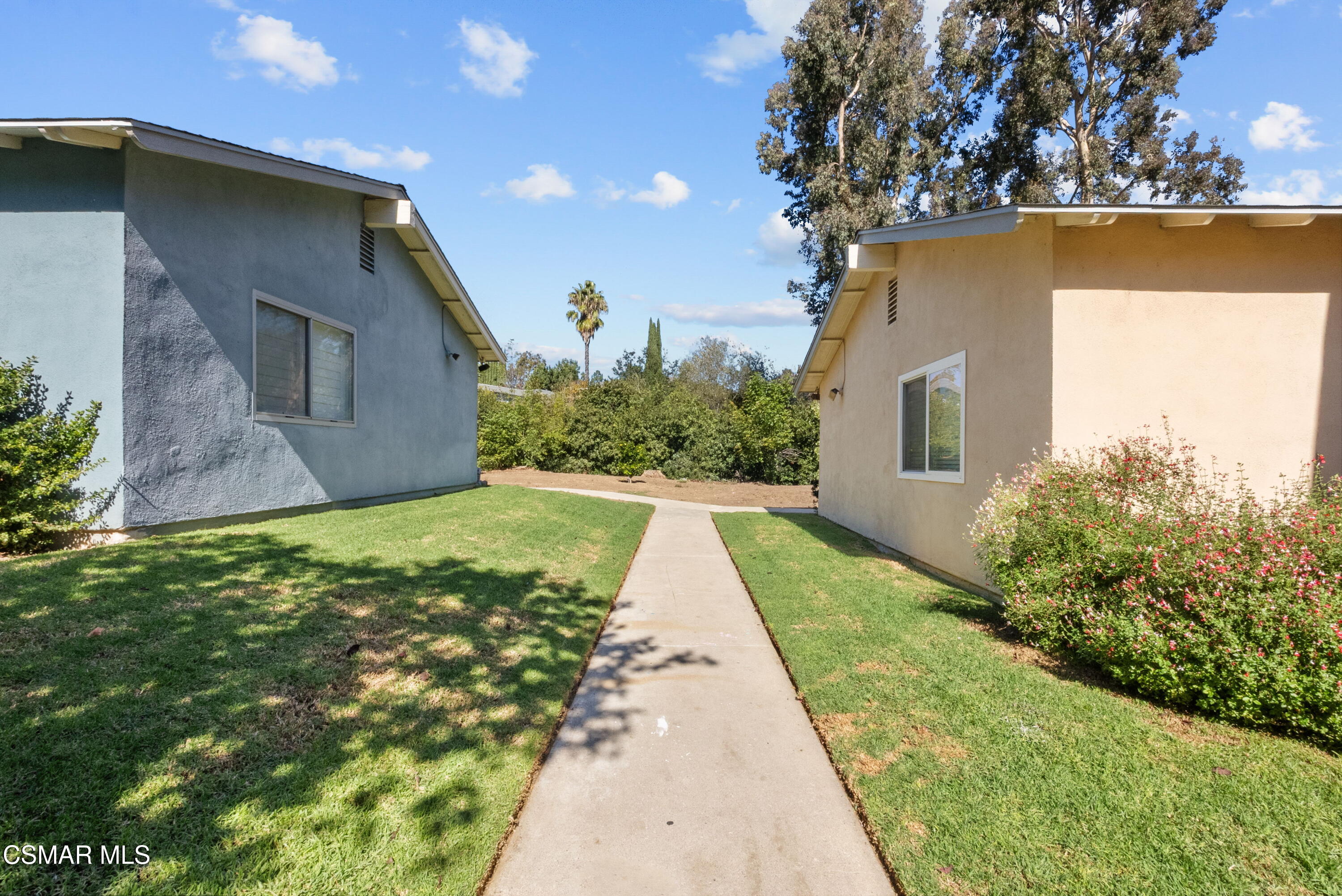 30535 Canwood Street, Unit R58 Agoura Hills, CA 91301 - Photo 22 of 23 a view of house with yard