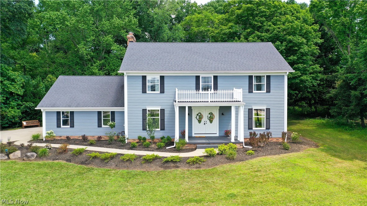 7231 Stow Road Hudson, OH 44236 - Photo 1 of 46 The front of the home with recently installed professional landscaping