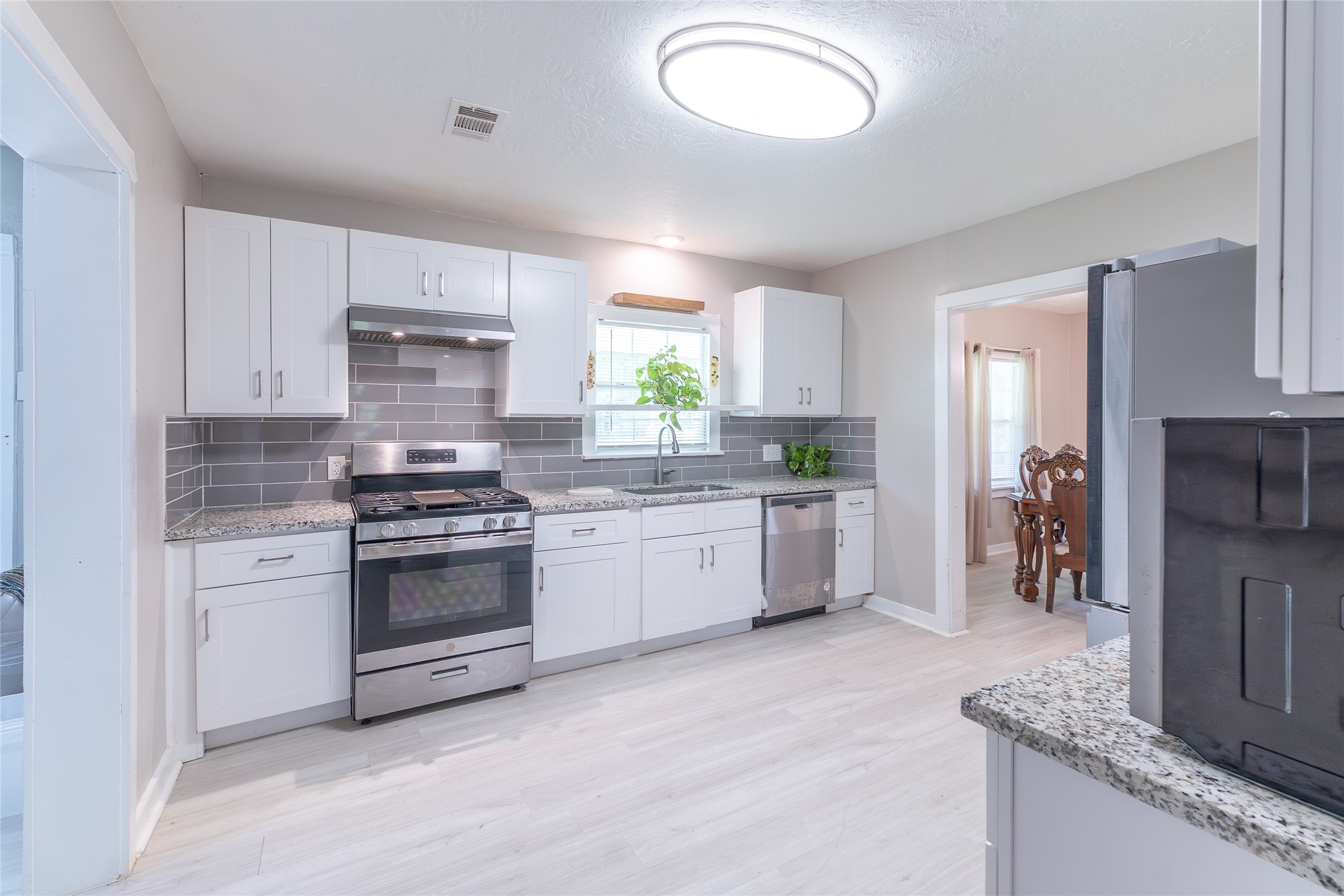2118 Rolling Hills Road Conroe, TX 77303 - Photo 2 of 39 The heart of the home, this beautifully updated kitchen blends style, function, and everyday convenience.