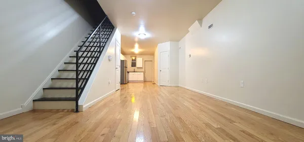 a view of entryway with wooden floor