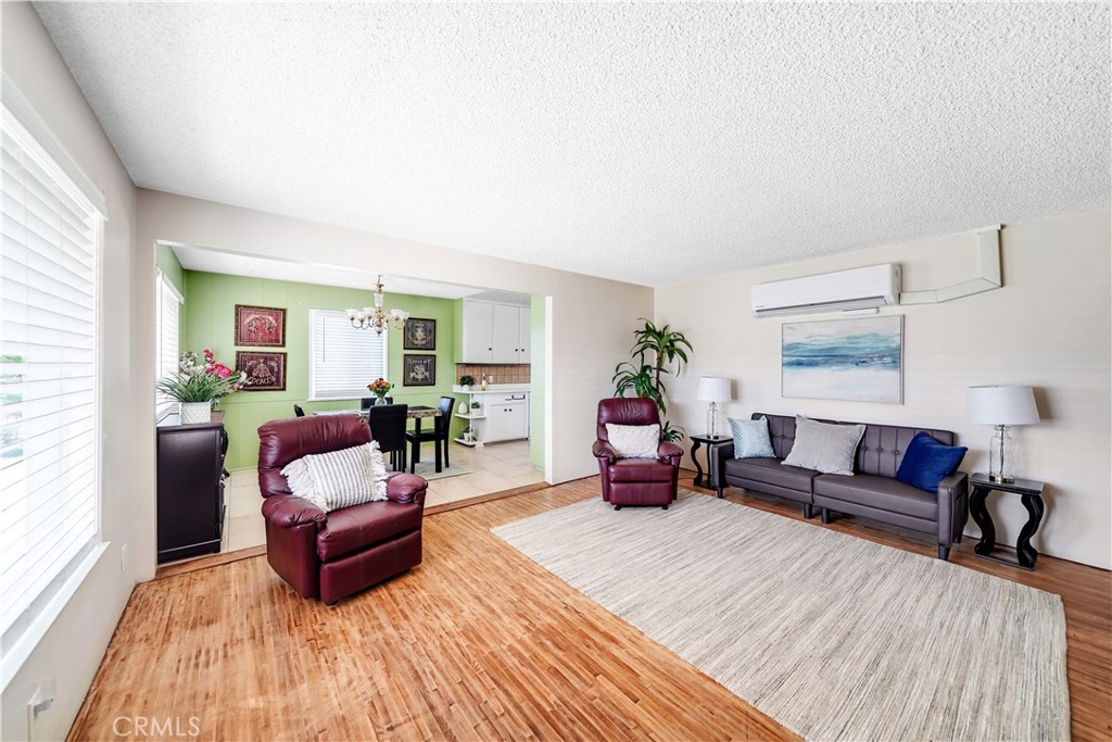 8201 Page Street Buena Park, CA 90621 - Photo 6 of 32 a living room with furniture and a couch