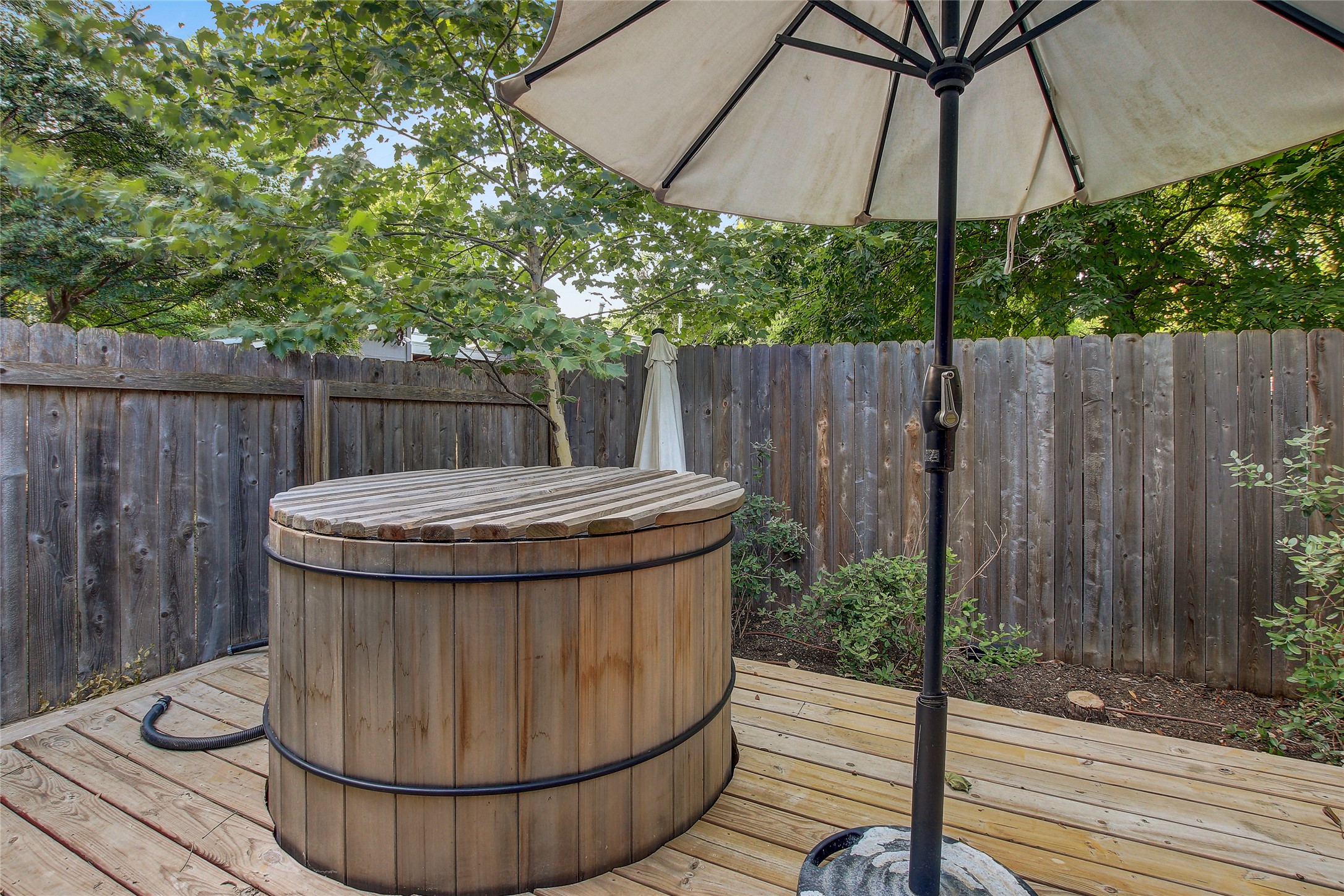 2006 Ford Street Austin, TX 78704 - Photo 20 of 40 Secluded deck off of primary bathroom with hot tob