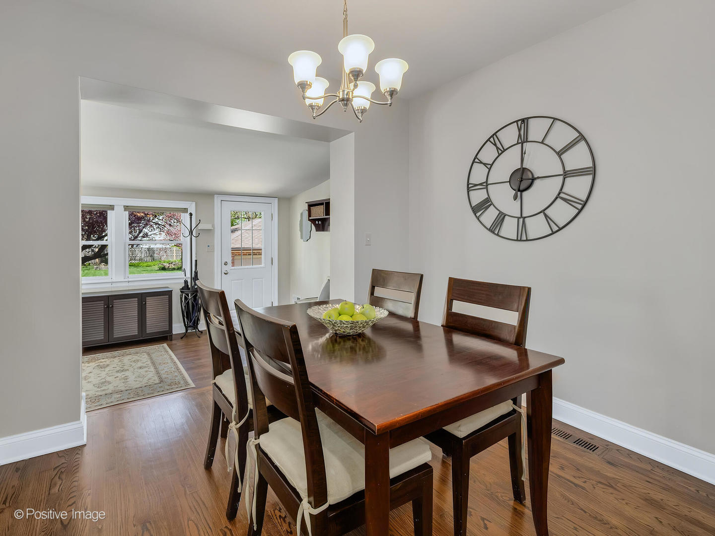 302 Southcote Road Riverside, IL 60546 - Photo 17 of 40 a view of a dining room with furniture and chandelier