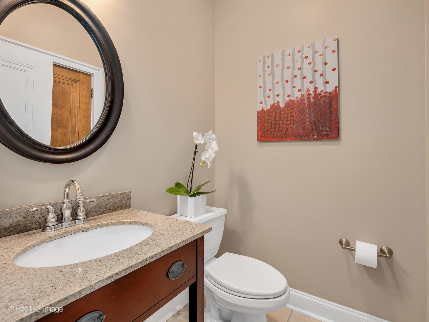 302 Southcote Road Riverside, IL 60546 - Photo 19 of 40 a bathroom with a granite countertop toilet a sink and a mirror