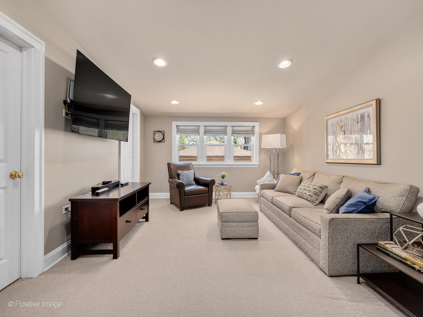 302 Southcote Road Riverside, IL 60546 - Photo 20 of 40 a living room with furniture and a flat screen tv
