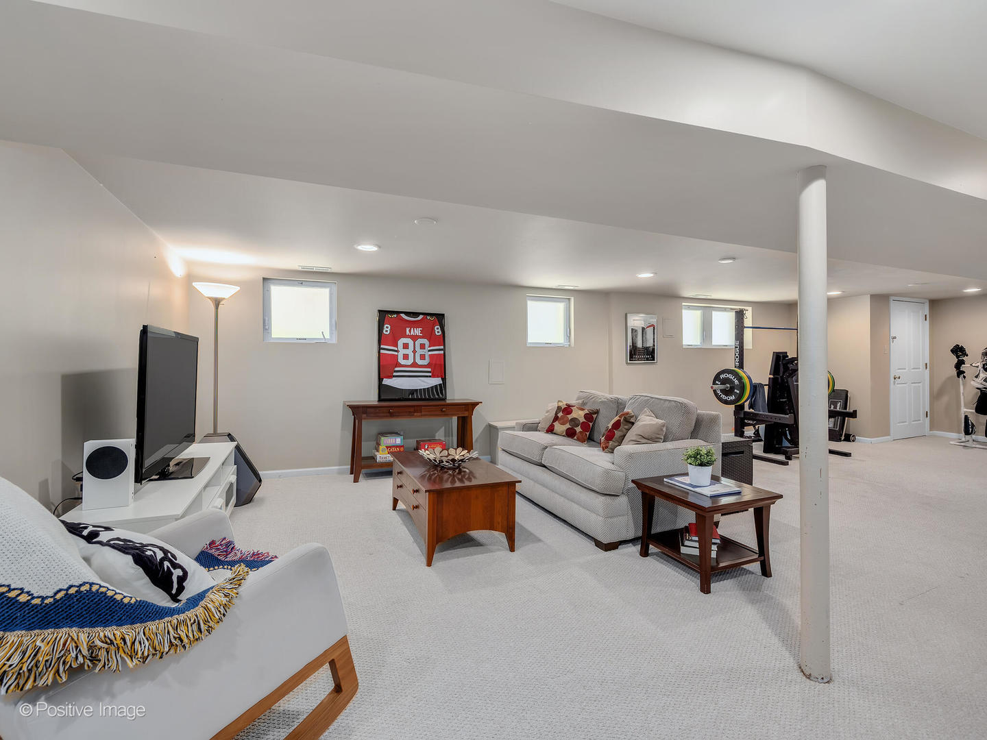 302 Southcote Road Riverside, IL 60546 - Photo 27 of 40 a living room with furniture and a flat screen tv