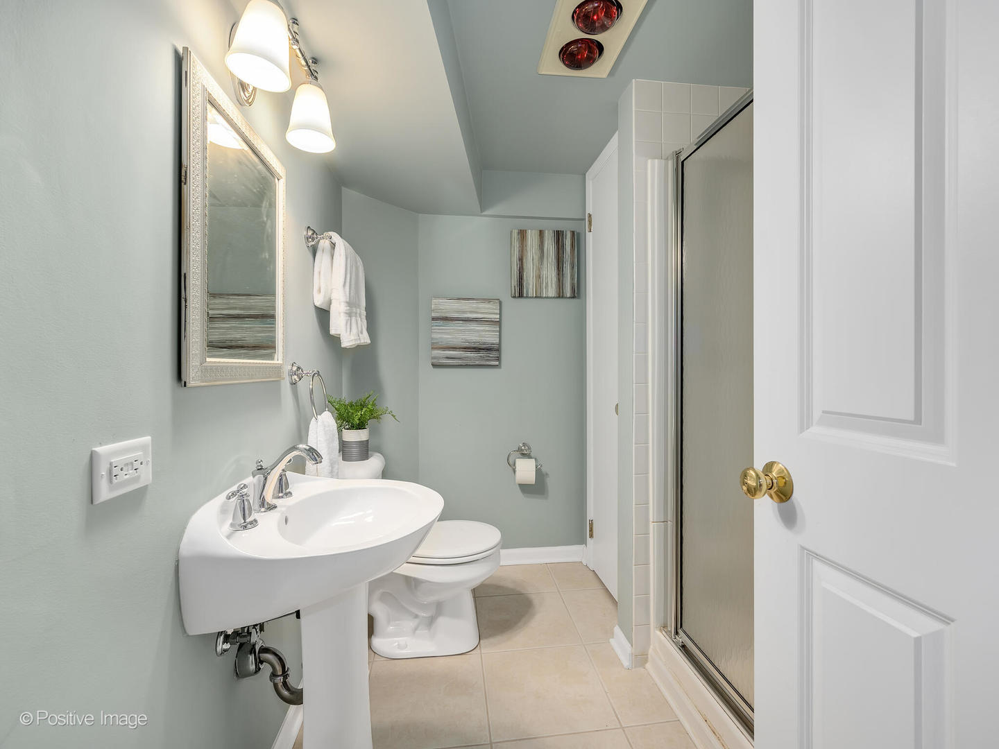 302 Southcote Road Riverside, IL 60546 - Photo 31 of 40 a bathroom with a sink a toilet and shower