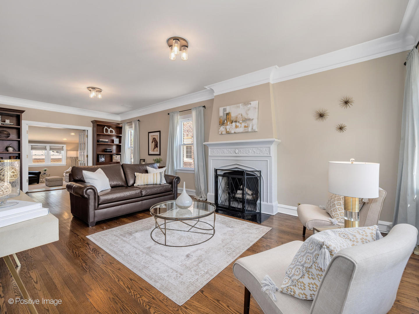 302 Southcote Road Riverside, IL 60546 - Photo 6 of 40 a living room with furniture and a fireplace