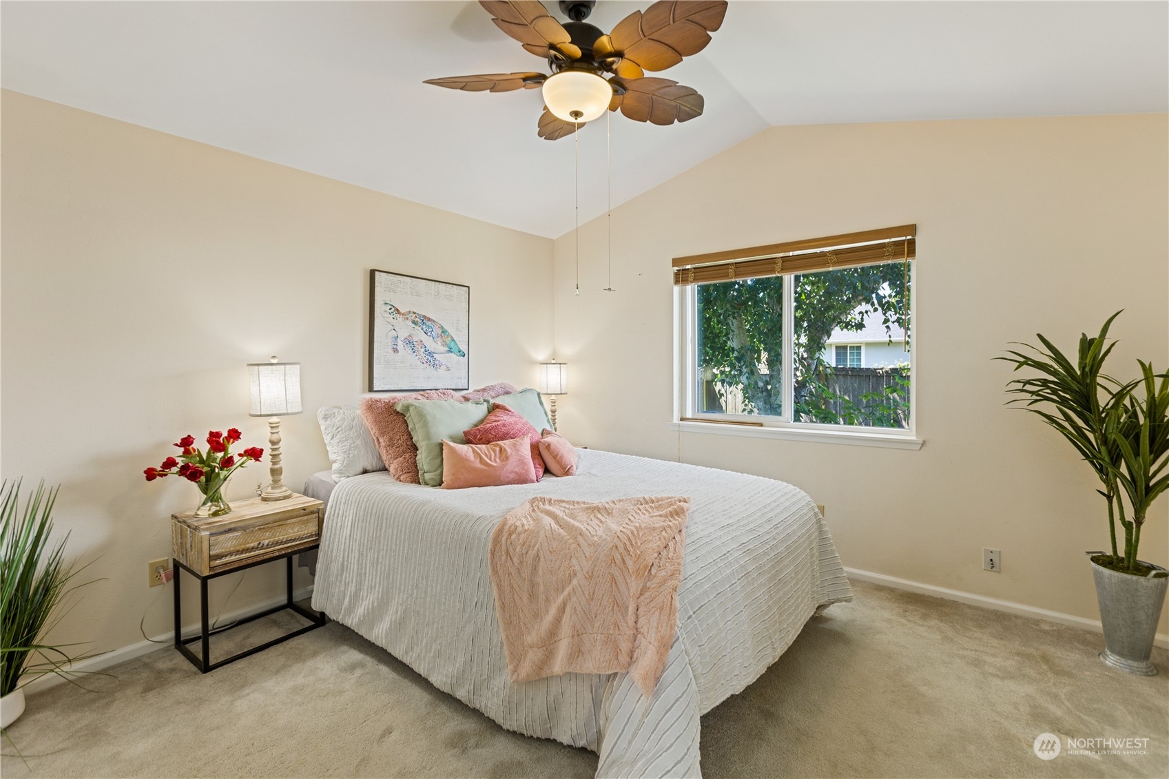 17514 Spring Ln Avenue Marysville, WA 98271 - Photo 5 of 8 a bedroom with a bed and a chandelier