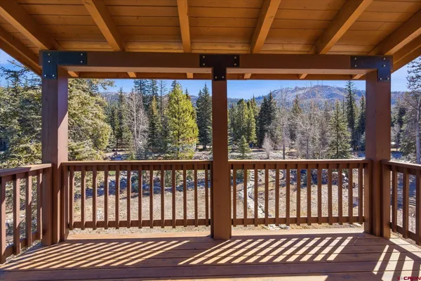 a view of a city with tall trees