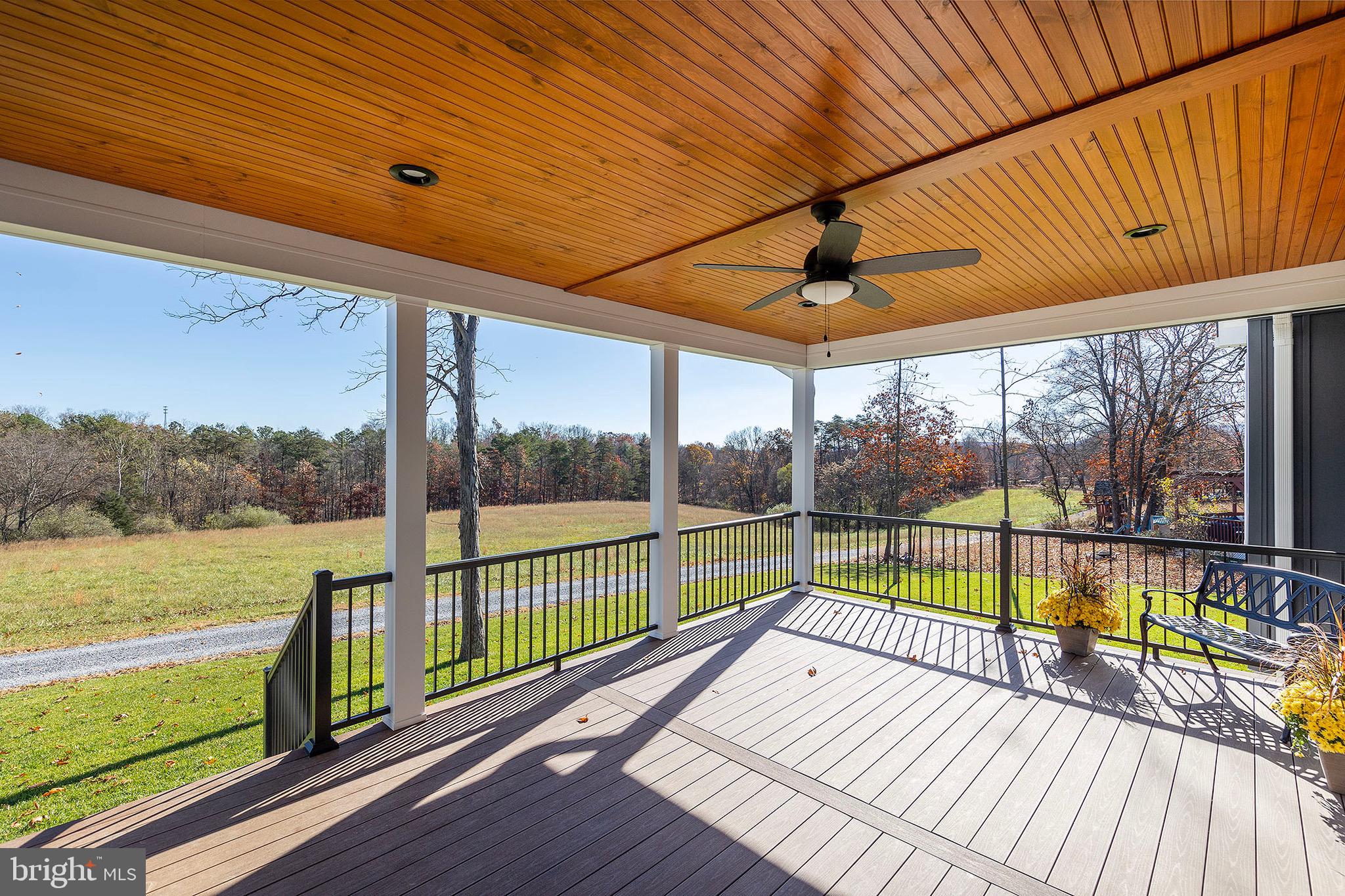 125 Holiday Road Cross Junction, VA 22625 - Photo 10 of 67 Covered Deck with Metal Railings and Pickets