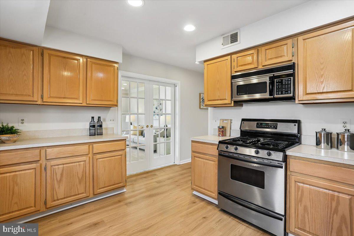 17413 Rio Dulce Court Olney, MD 20832 - Photo 19 of 85 Pocket doors to family room