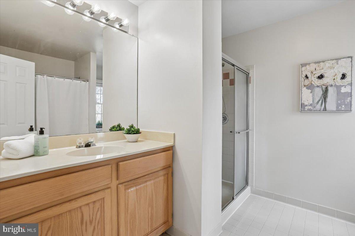 17413 Rio Dulce Court Olney, MD 20832 - Photo 38 of 85 Primary Bathroom with separate shower and bathtub