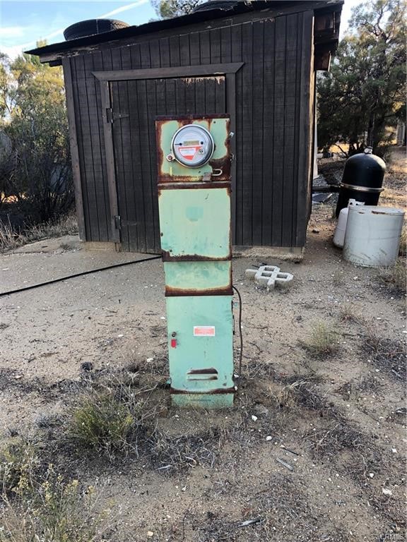 58160 Bliss Road Anza, CA 92539 - Photo 11 of 24 a backyard of a house with barbeque oven