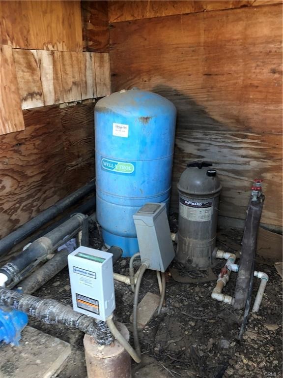58160 Bliss Road Anza, CA 92539 - Photo 12 of 24 a toilet sitting on top of a wooden floor