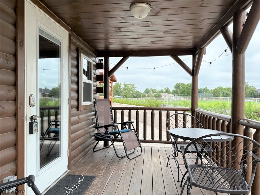 5919 Lake Road West, Unit 8 Ashtabula, OH 44004 - Photo 9 of 35 Covered front porch
