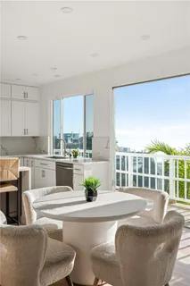 a view of living room with granite countertop furniture and a fireplace
