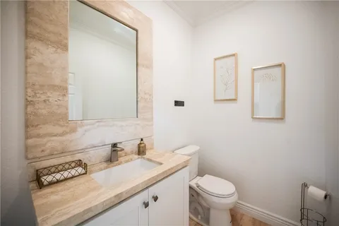 a bedroom with a large bed and a large window