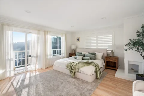 a large white bed in a white room