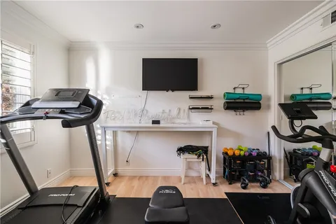 a kitchen with a stove a sink and a refrigerator
