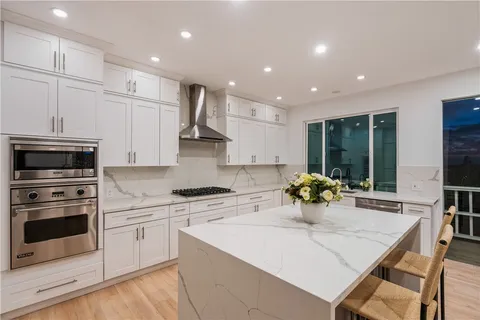 an aerial view of residential building with parking space