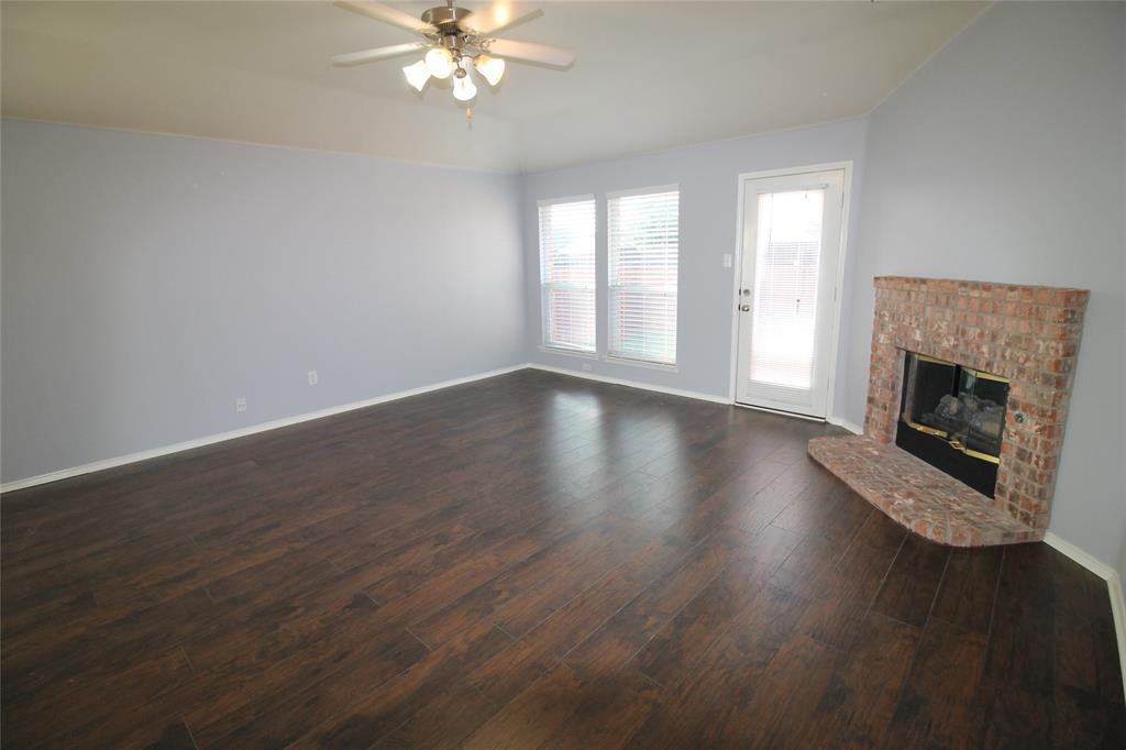 4188 Cherry Ridge Drive Frisco, TX 75033 - Photo 10 of 25 a view of an empty room with wooden floor and a window