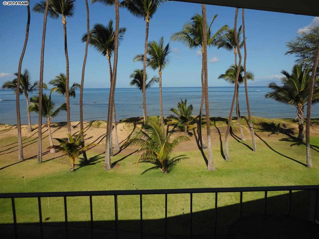 1310 Uluniu Road, Unit 317 Kihei, HI 96753 - Photo 8 of 21 a view of swimming pool with a table and chairs