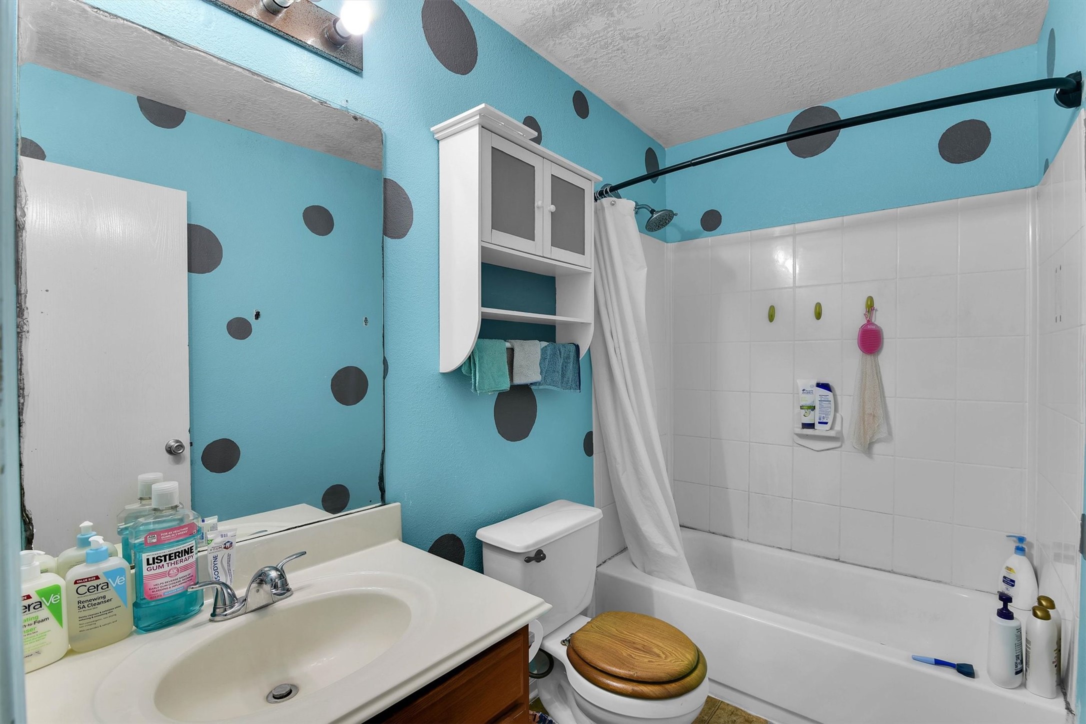 3003 Legends York Drive Spring, TX 77386 - Photo 24 of 29 a bathroom with a sink toilet and shower