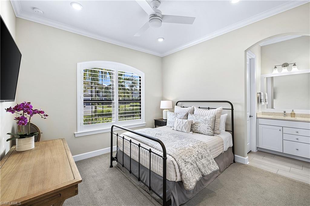 19074 Elston Way Estero, FL 33928 - Photo 19 of 50 a bedroom with a bed and a window