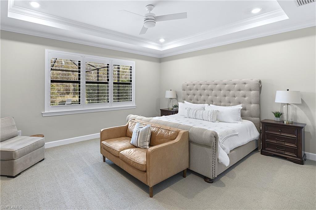 19074 Elston Way Estero, FL 33928 - Photo 25 of 50 a bedroom with bed couch and window