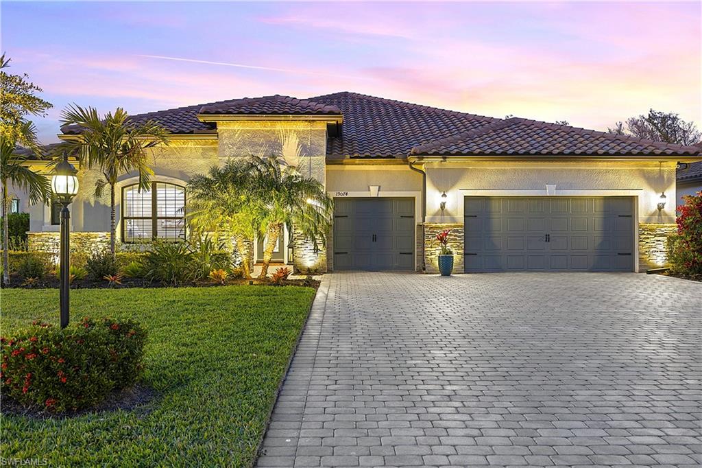 19074 Elston Way Estero, FL 33928 - Photo 3 of 50 a view of a house with a ocean view