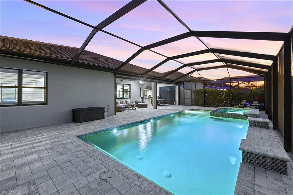 19074 Elston Way Estero, FL 33928 - Photo 41 of 50 a view of swimming pool with a patio